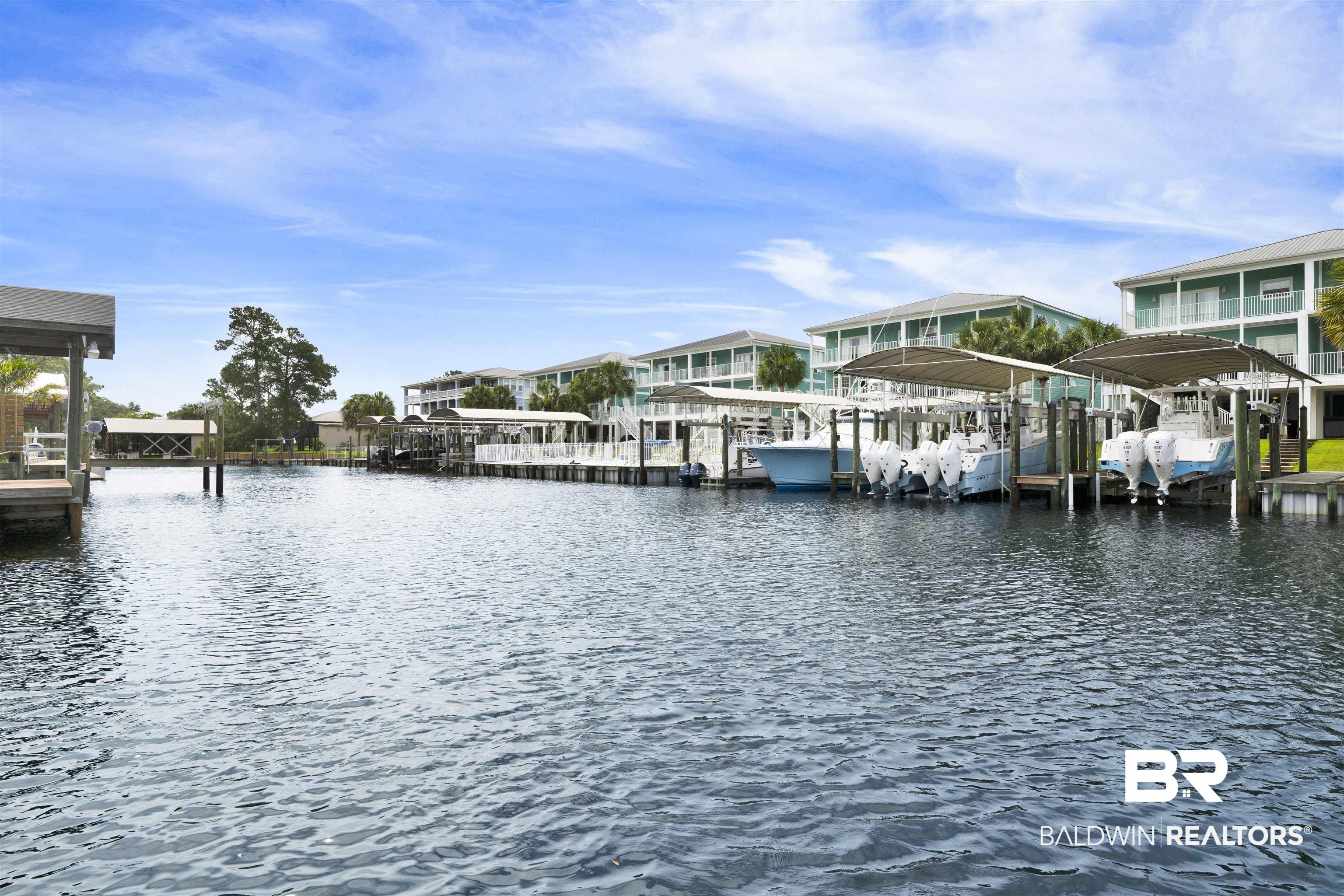 Image 4: Waterfront properties with private boat slips featuring covered boat lifts