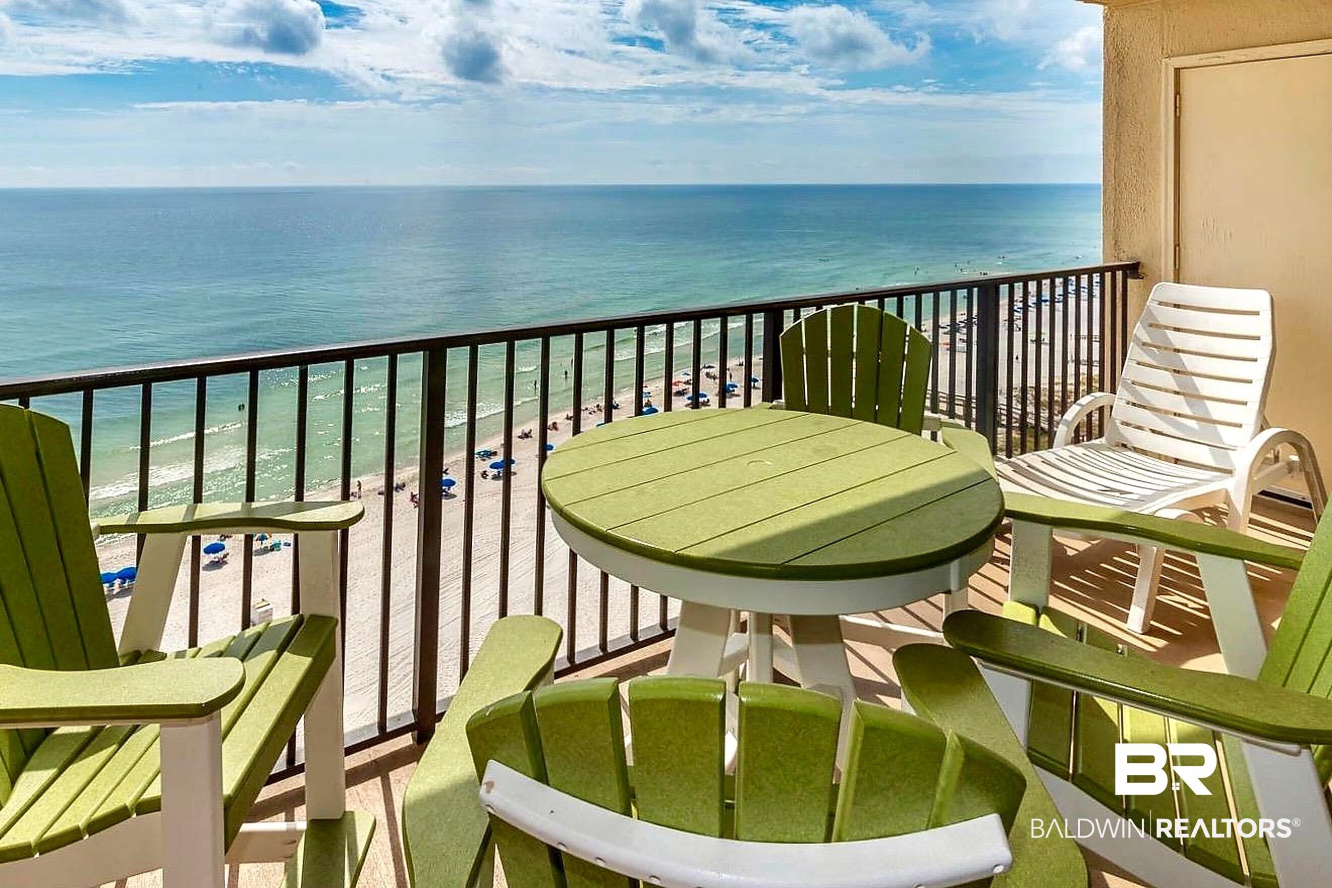 Image 4: Private balcony featuring a metal railing and expansive ocean backdrop