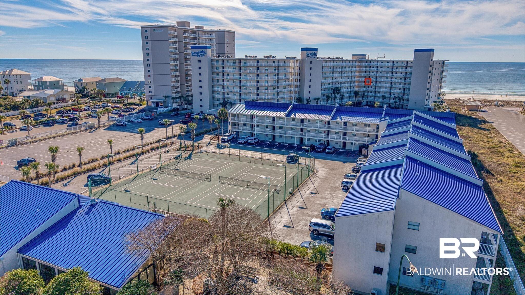 Image 3: Drone / aerial view of a large body of water and apartment complex / building