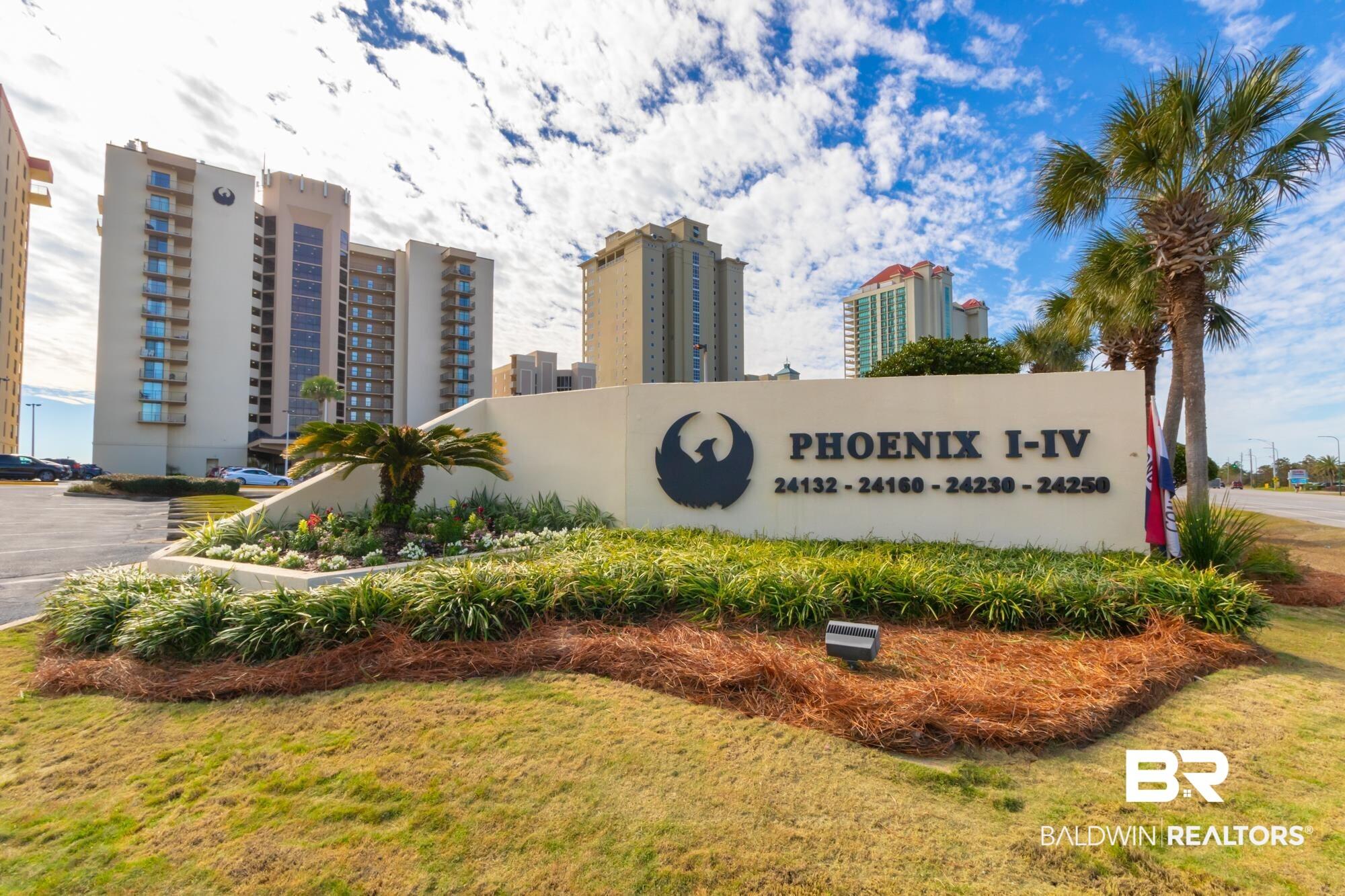 Image 2: Phoenix I-IV property entrance sign featuring a prominent emblem and building addresses