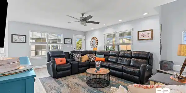 Image 3: Living area with recessed lighting, wood finished floors, and ceiling fan