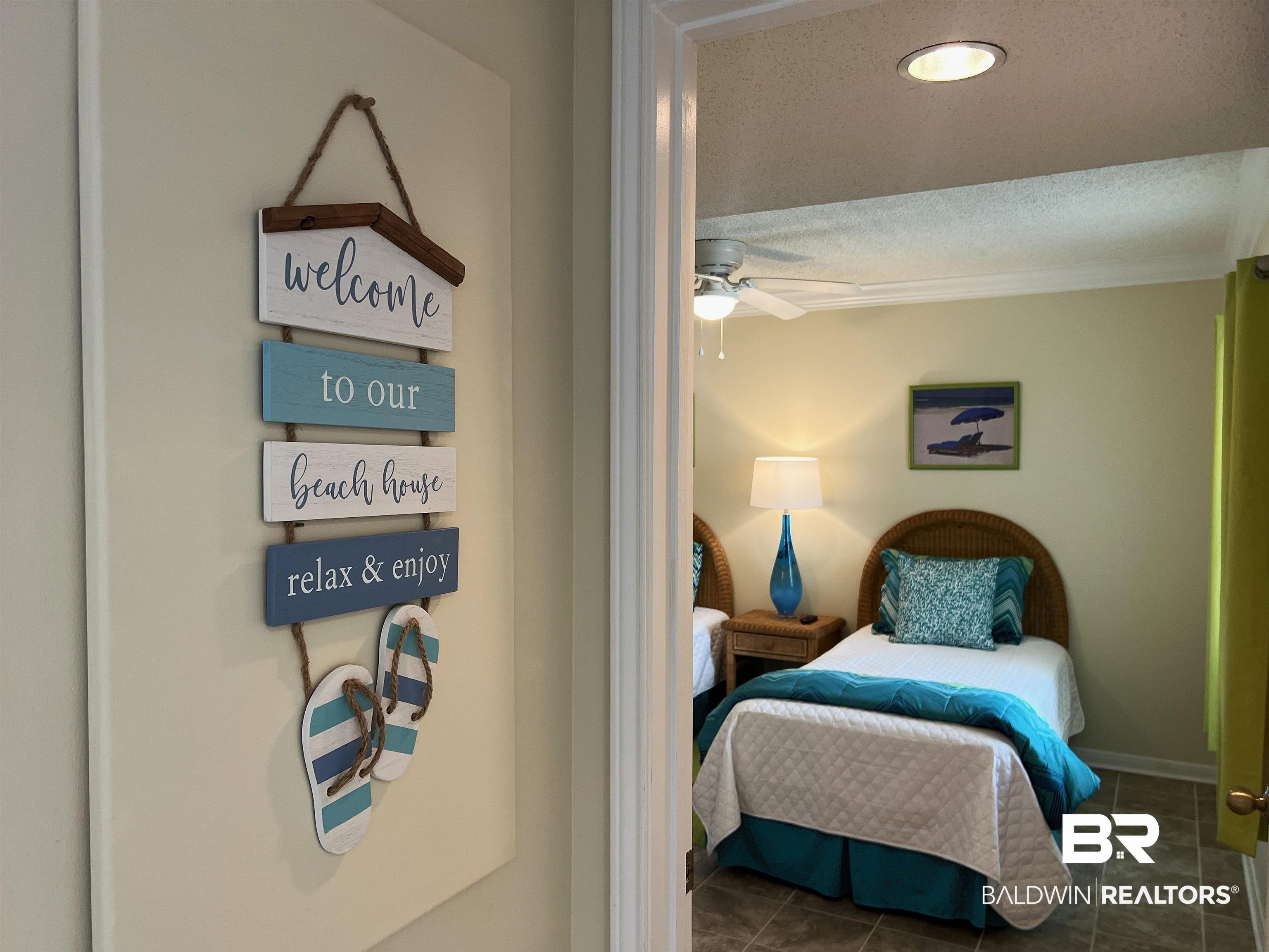 Image 2: Guest room featuring a ceiling fan, recessed lighting, and tiled flooring