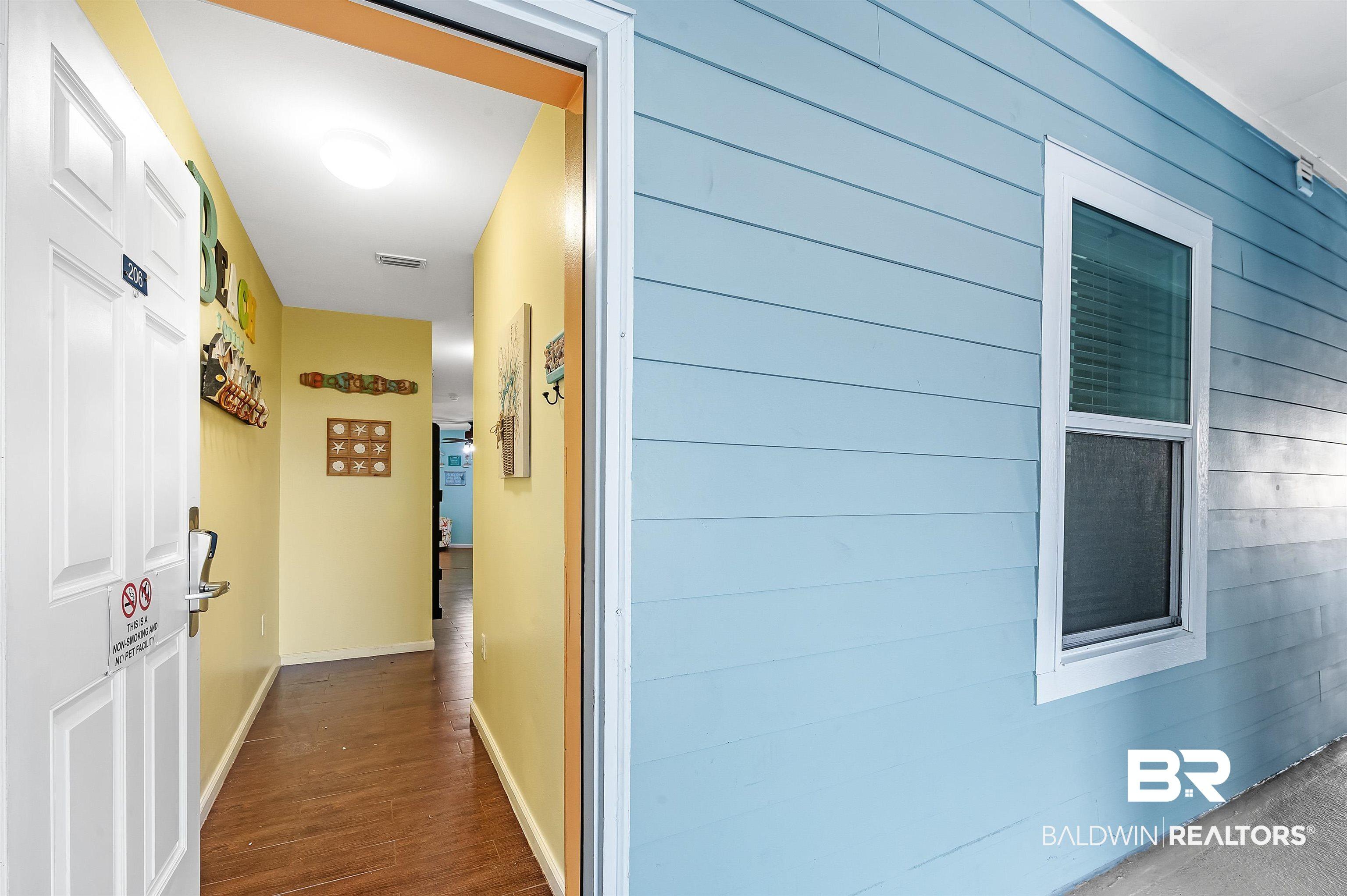 Image 3: Exterior siding in a light blue finish
