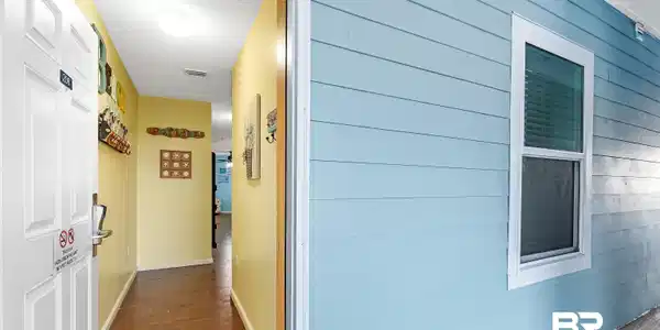 Image 3: Exterior siding in a light blue finish