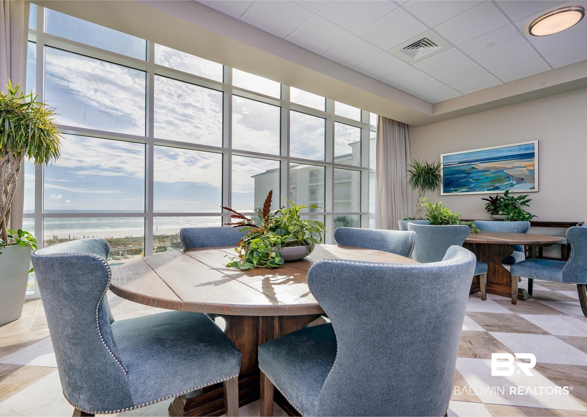 Image 2: Floor-to-ceiling windows with expansive ocean scenery