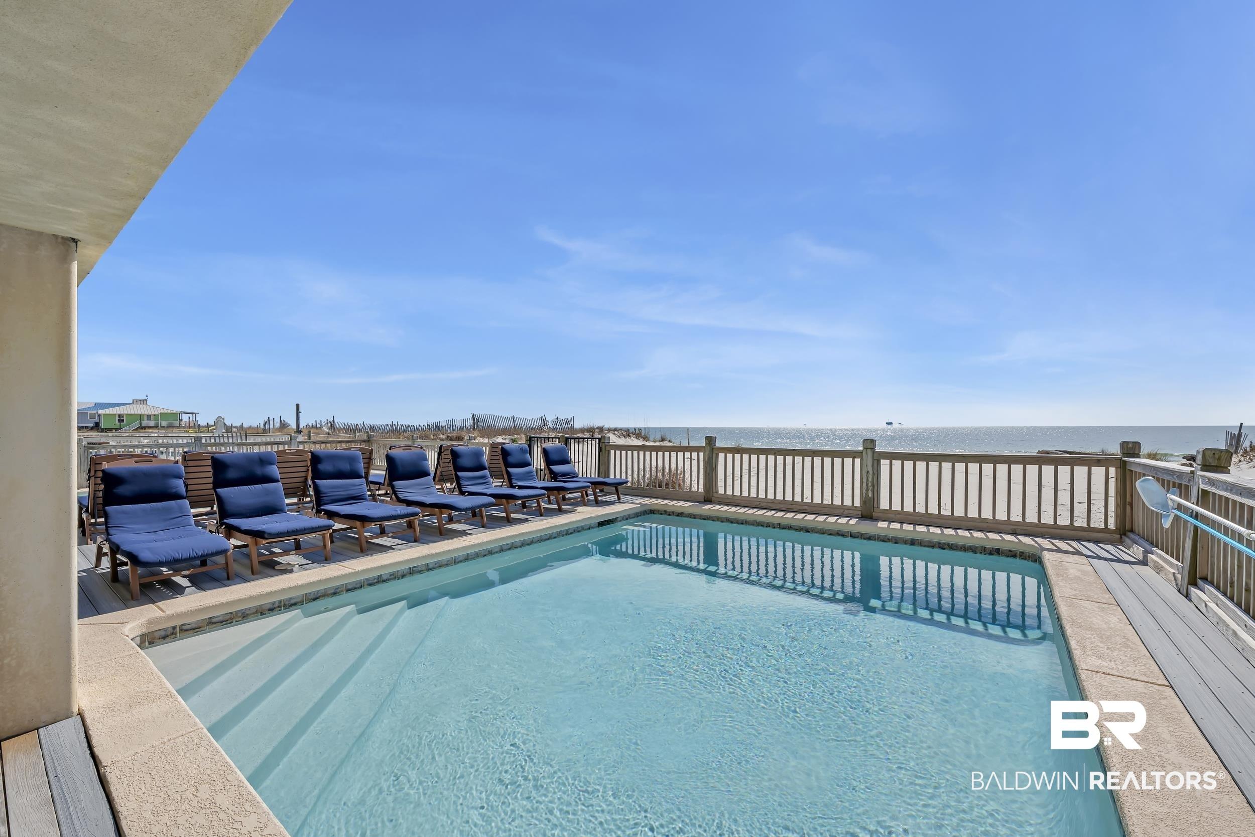Image 4: View of pool featuring a water view