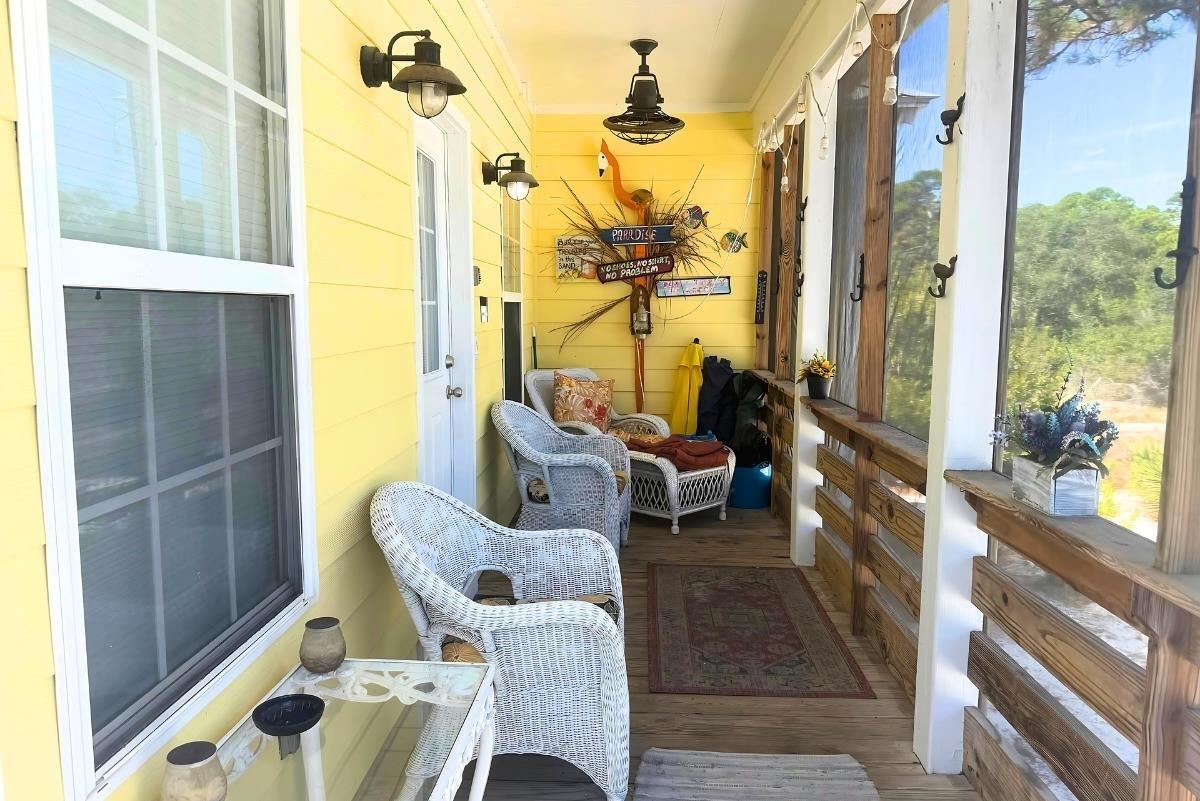 Image 3: Balcony with a sunroom
