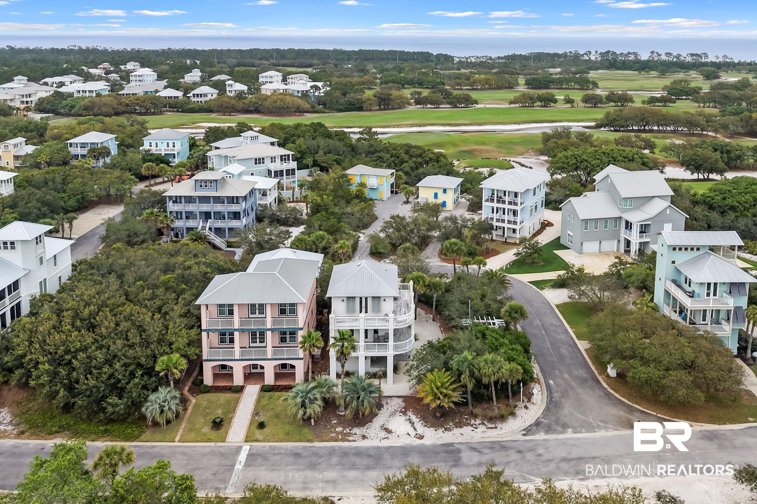 Image 3: Coastal community featuring multiple residences with varied architectural styles