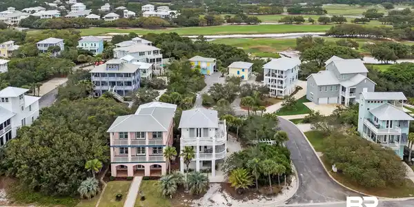 Image 3: Coastal community featuring multiple residences with varied architectural styles