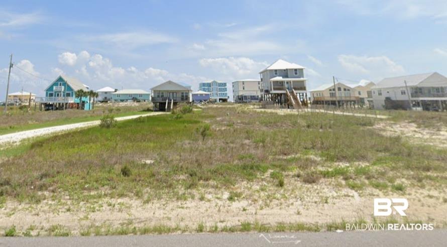 Image 1: View of yard with a residential view