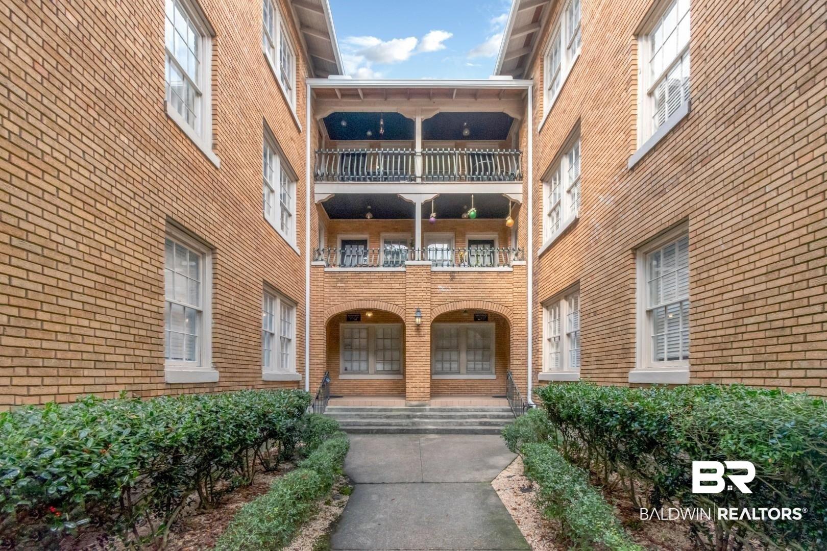 Image 2: View of apartment building / complex