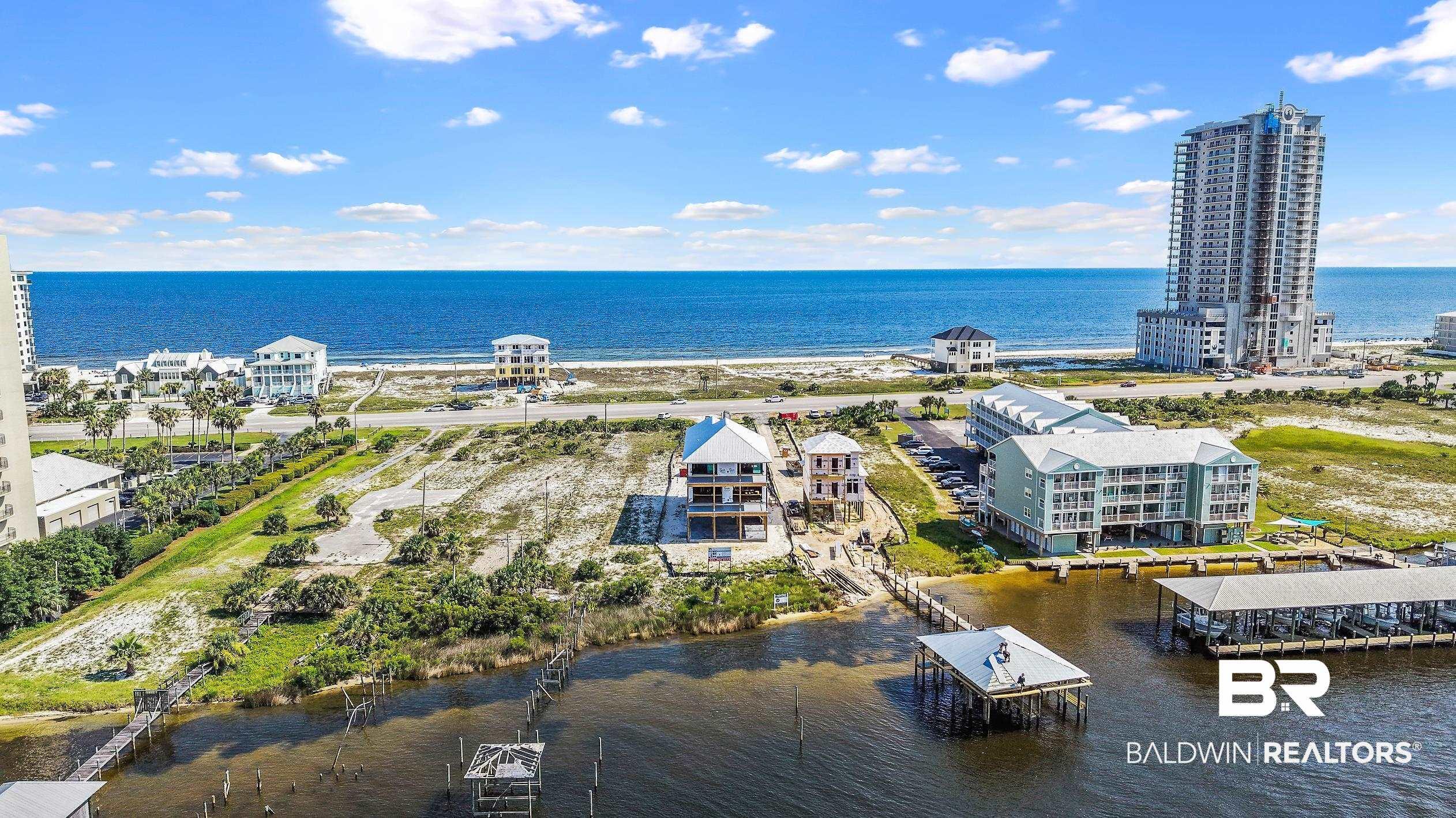 Image 4: Expansive waterfront property featuring a boat dock, boat slips, direct water access, and proximity to the Gulf of Mexico