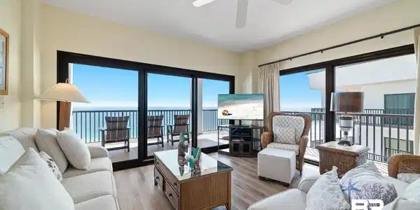 Image 4: Living room featuring wood finished floors, ceiling fan, plenty of natural light, and a textured ceiling