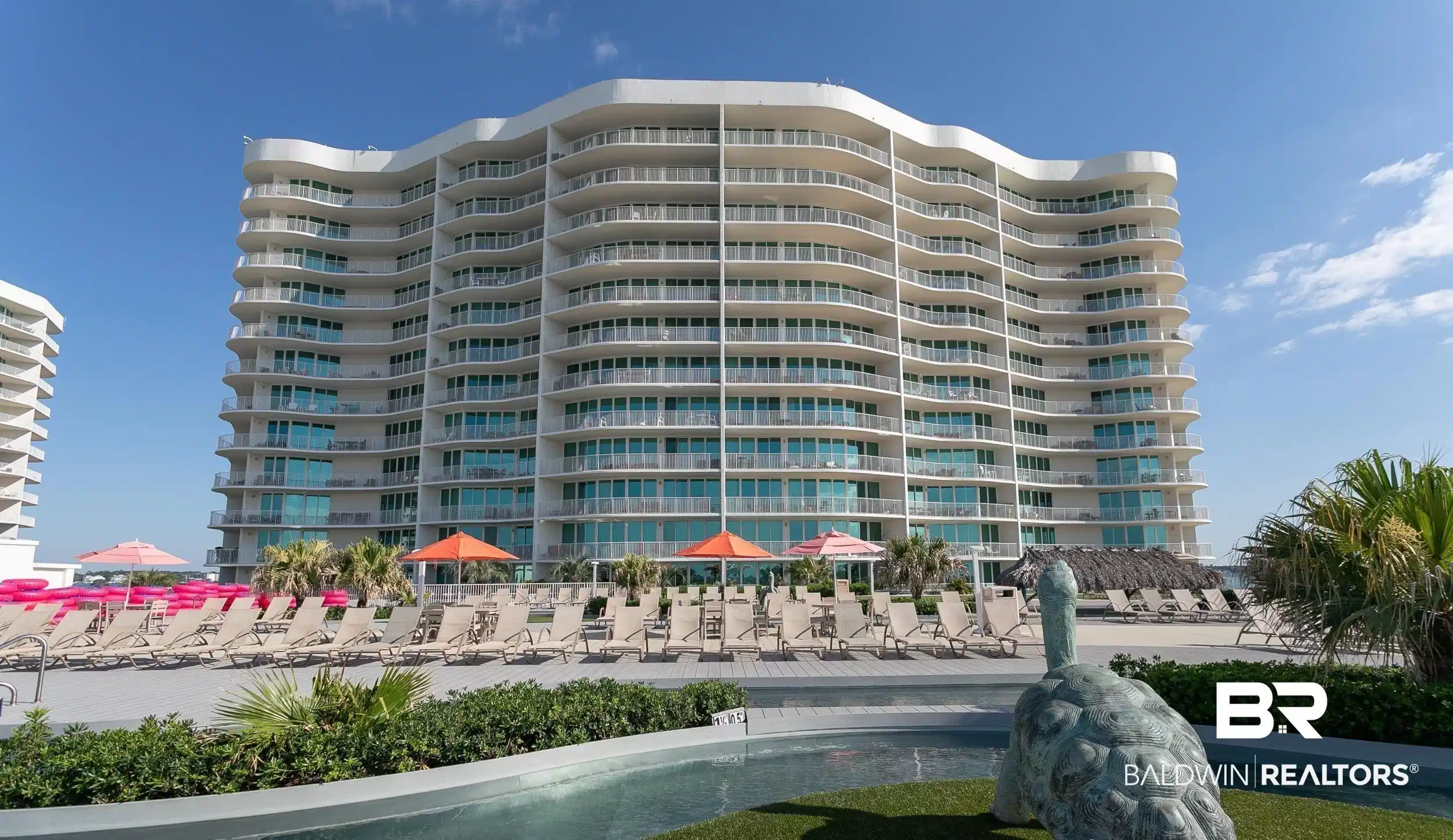 Image 1: View of apartment building / complex
