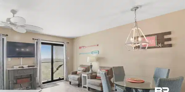 Image 4: Dining room with ceiling fan, a chandelier, and wood finish floors