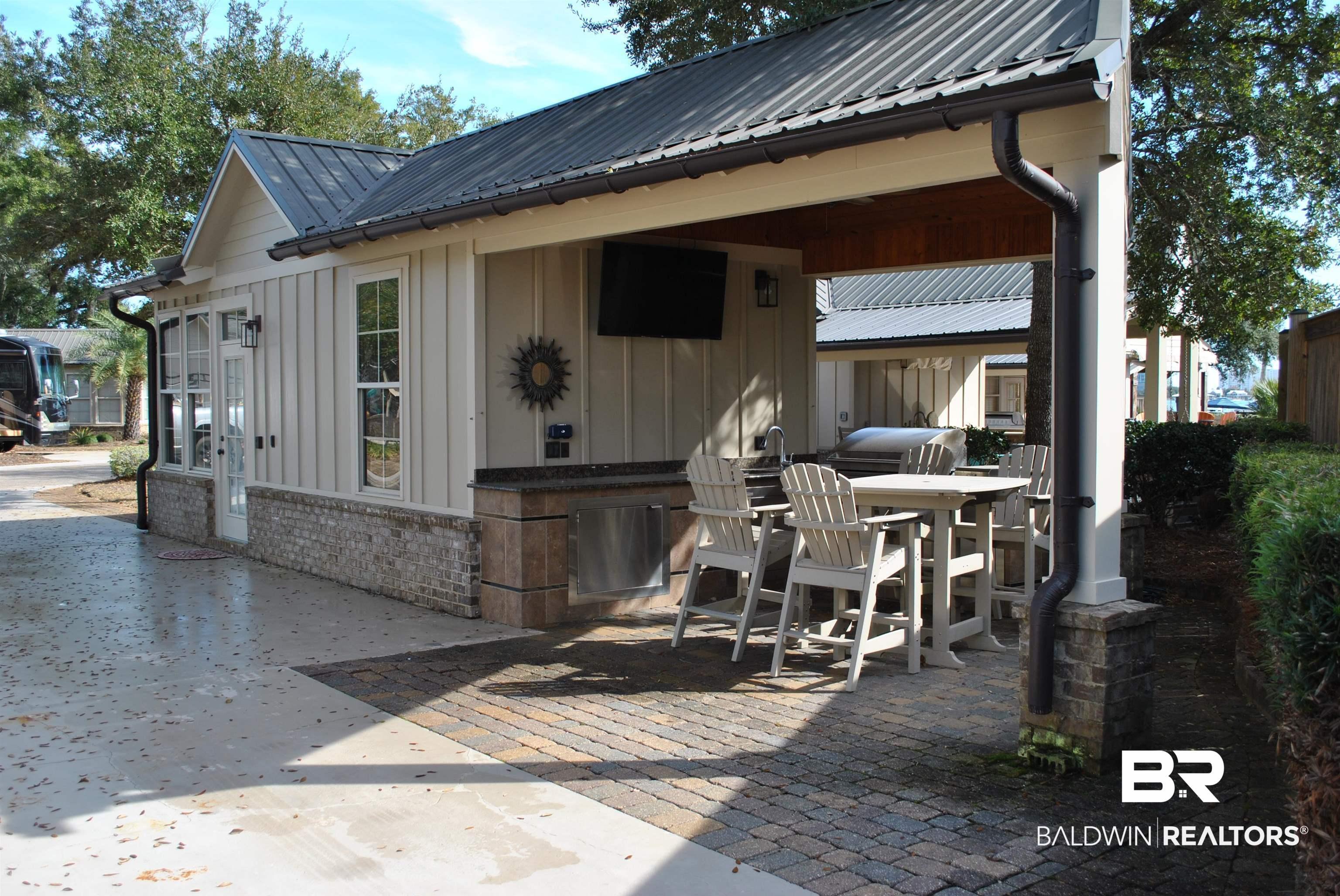Image 3: View of patio / terrace featuring area for grilling