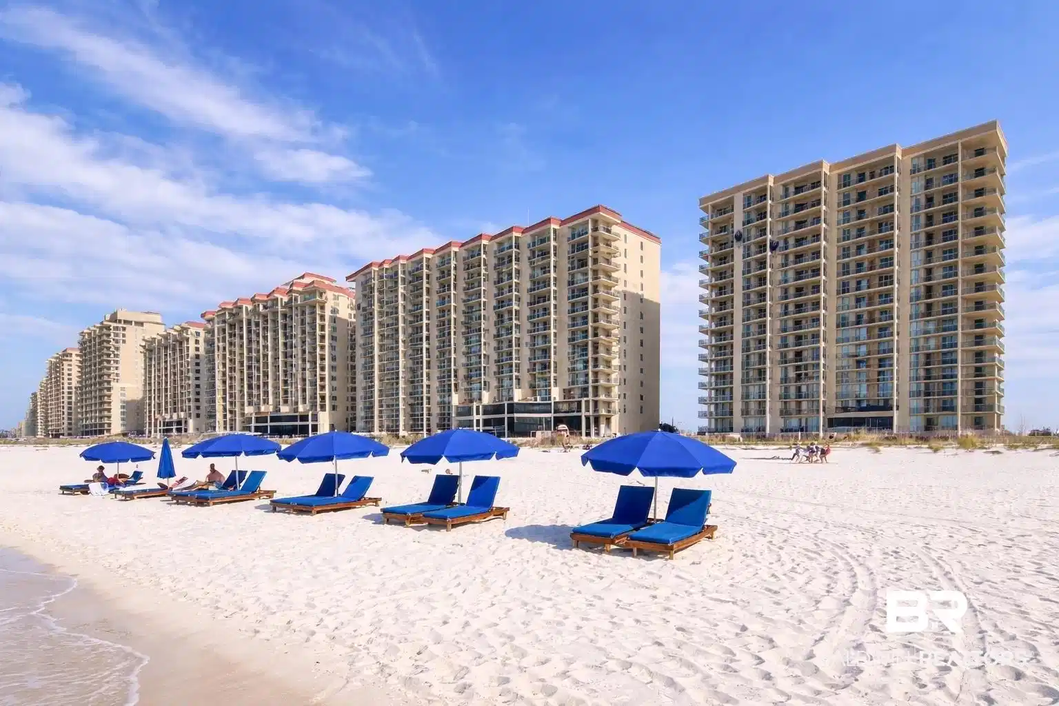 Image 1: View of apartment building / complex featuring view of water and beach