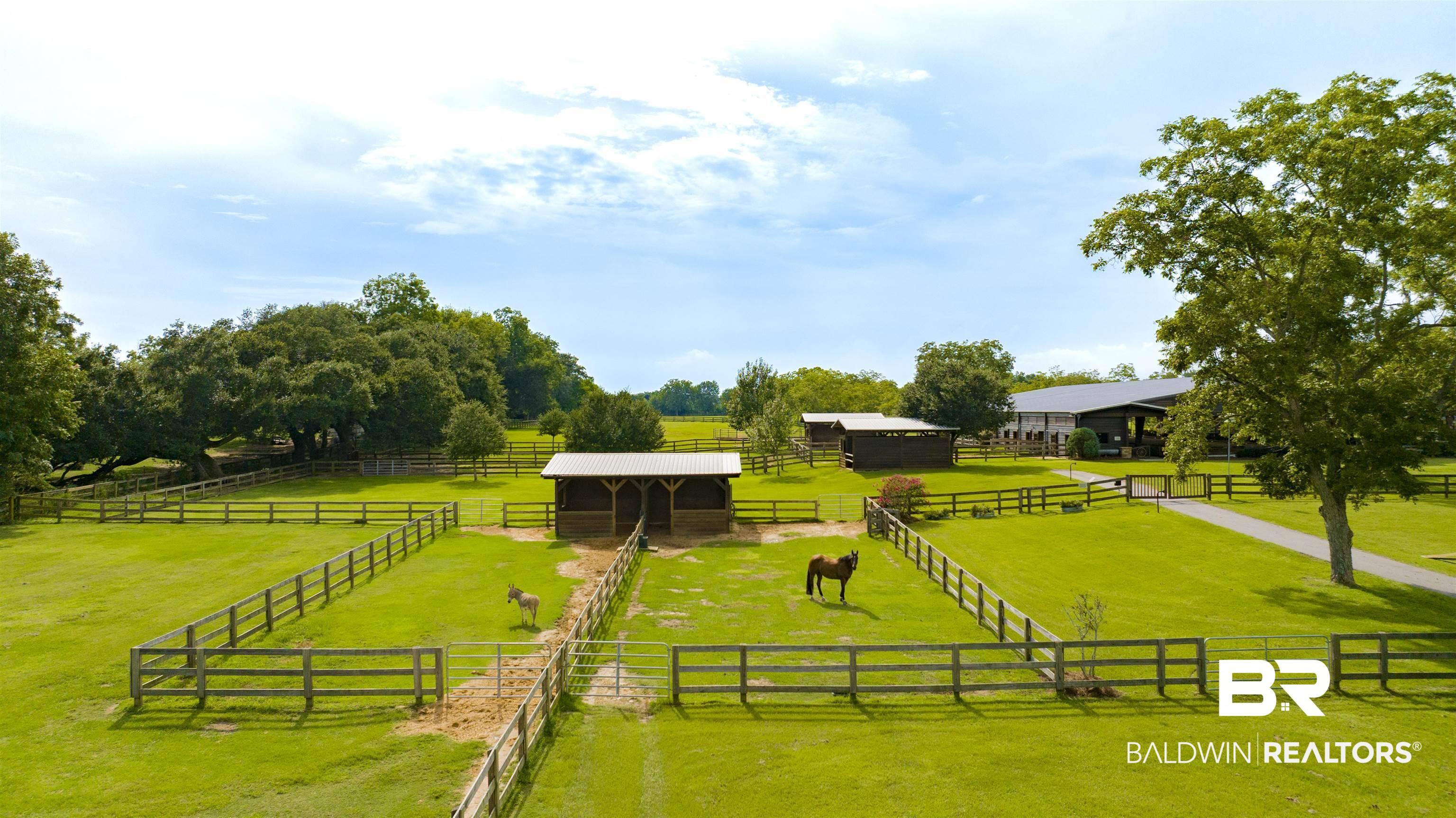 Image 2: View of home's community with an outbuilding, a rural view, and an exterior structure