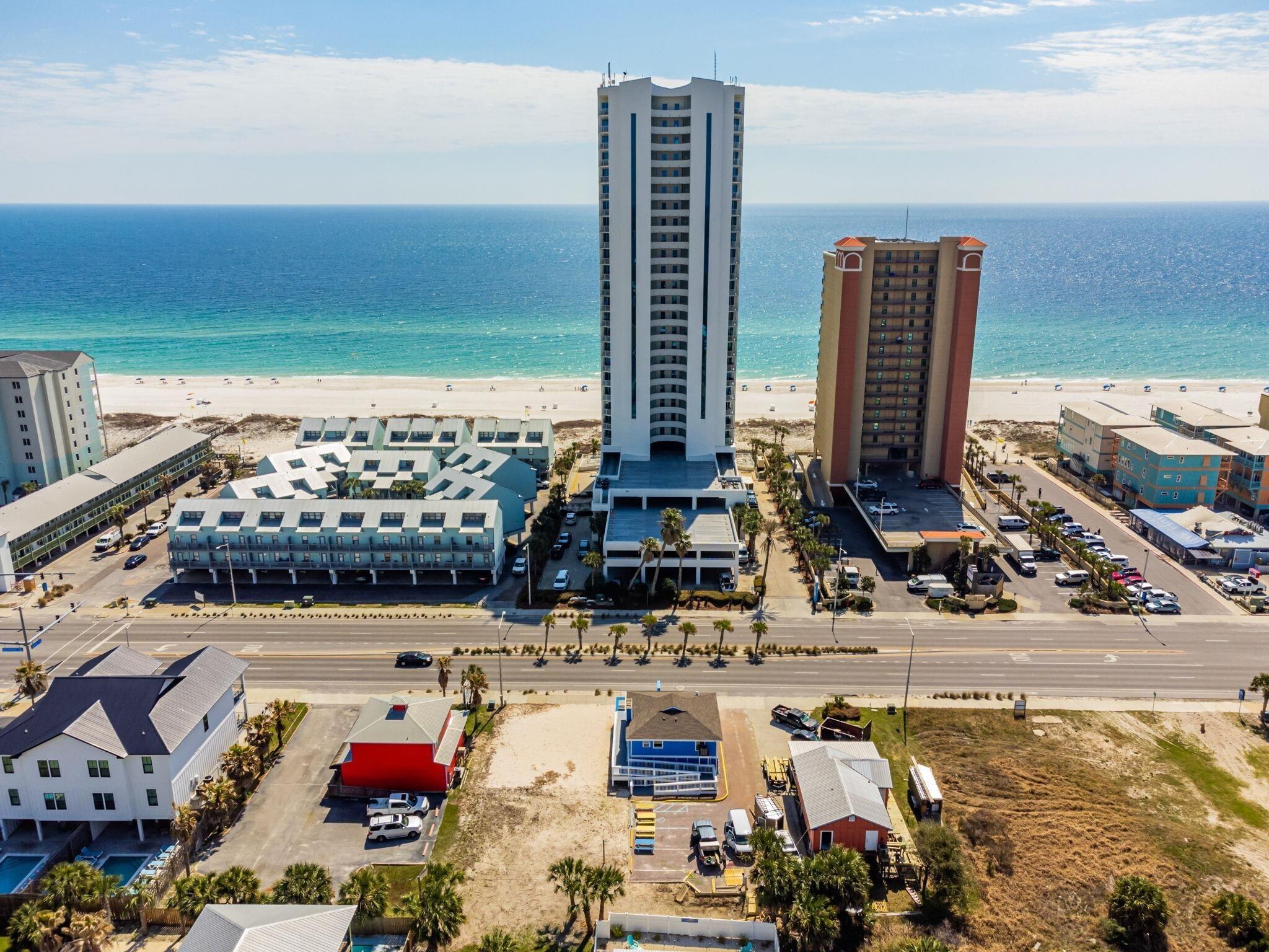Image 4: Drone / aerial view with a beach view and a water view