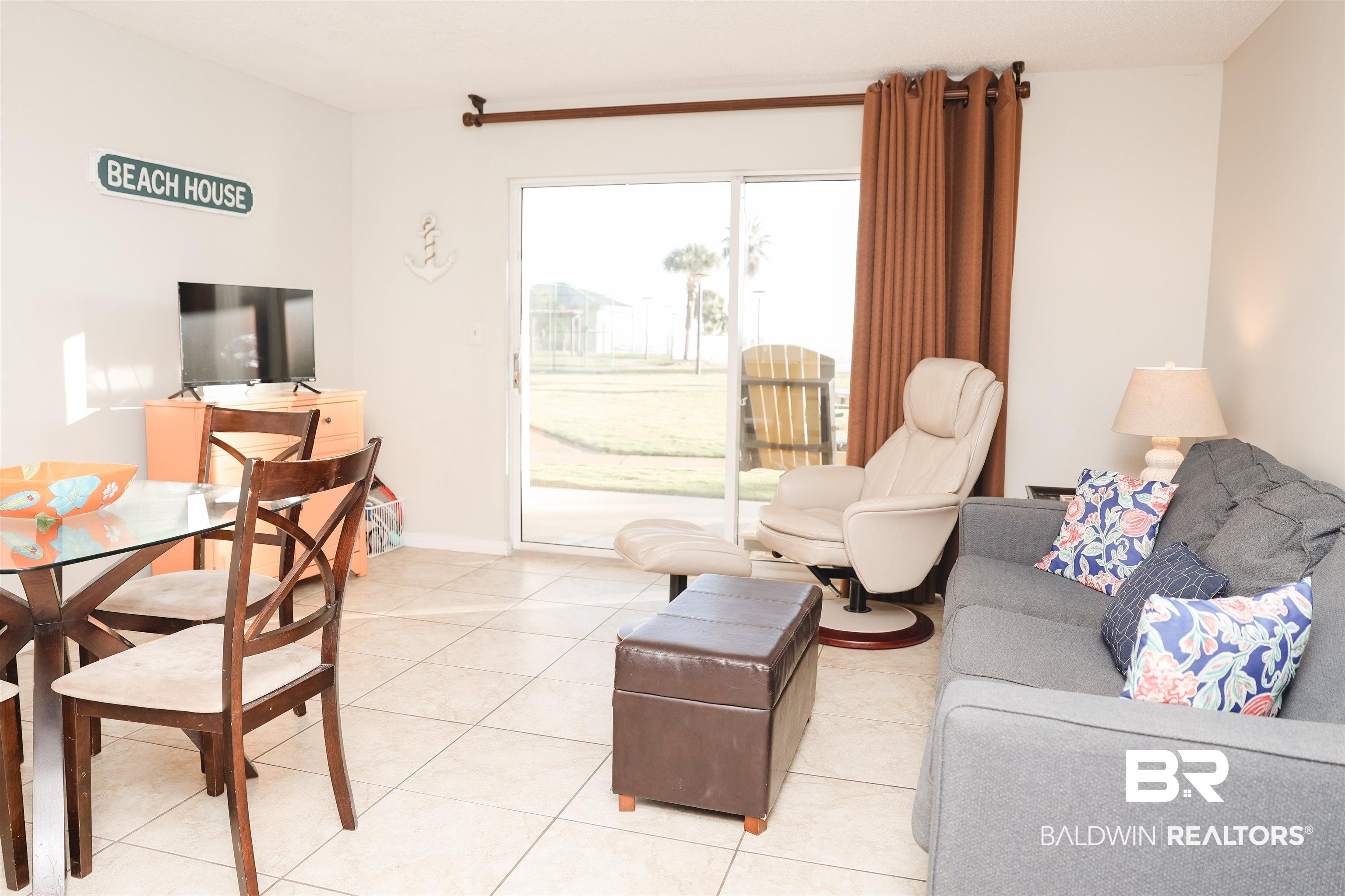 Image 4: View of tiled living area