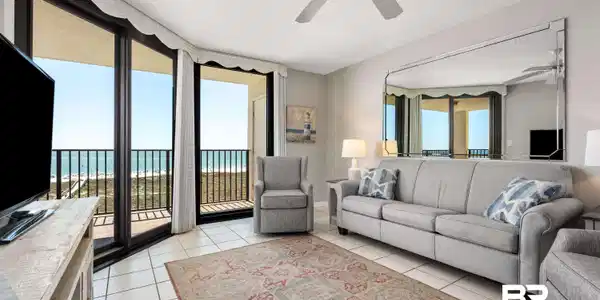 Image 4: Living room featuring a textured ceiling and a ceiling fan