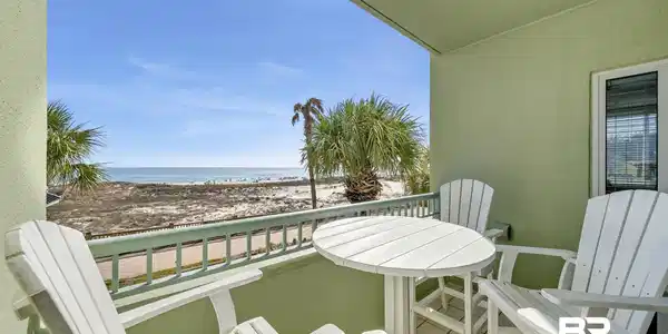 Image 4: Balcony with view of water and beach