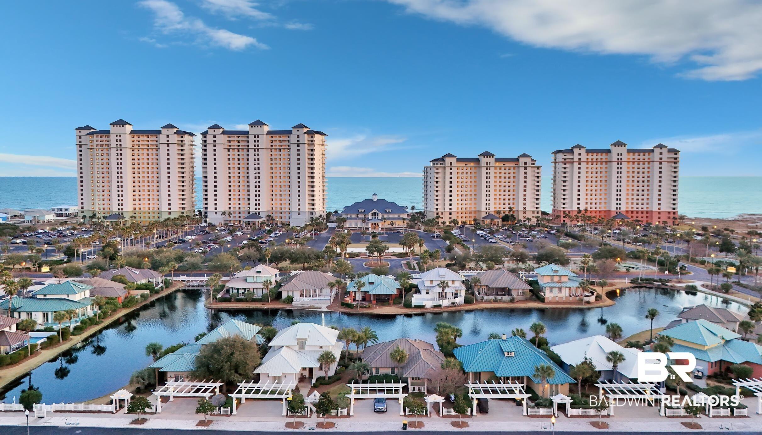 Image 3: View of urban area with a large body of water