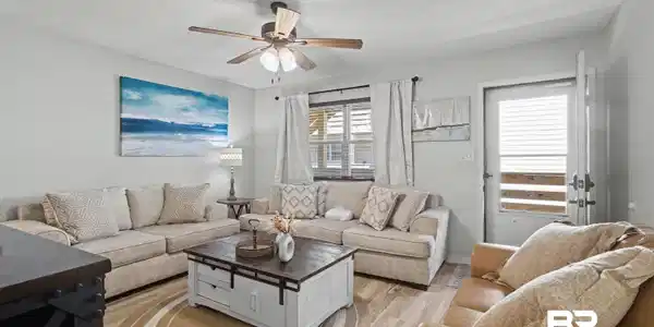 Image 2: Numerous Updates including vinyl flooring throughout, Painted Bathroom & Kitchen Cabinets with new hardware, updated Countertops- Quartz in the Kitchen and Granite in both Bathrooms. And more!