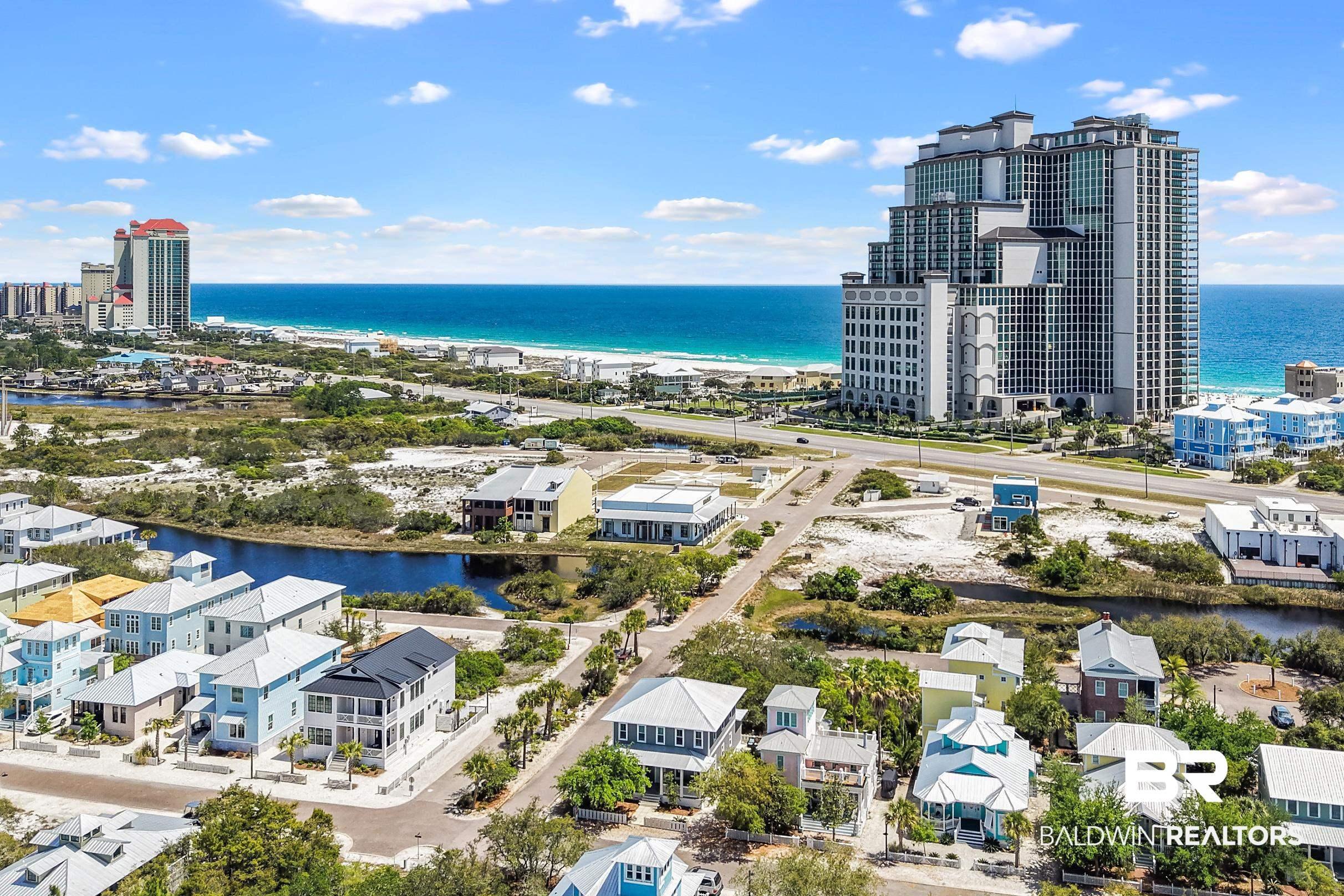 Image 3: Aerial perspective showcasing coastal property and surrounding community