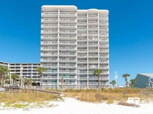 Image 1: View of apartment building / complex
