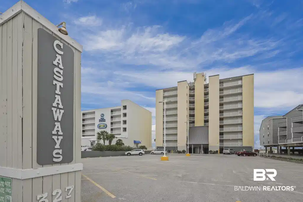Image 1: View of apartment building / complex featuring uncovered parking