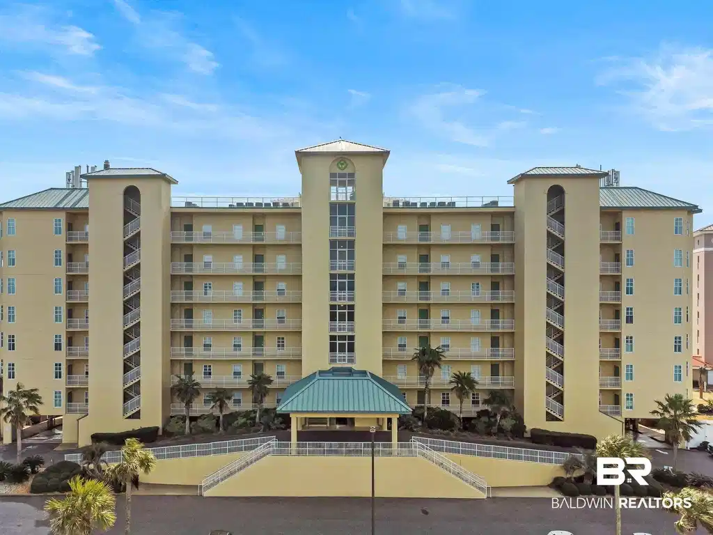Image 1: View of apartment building / complex