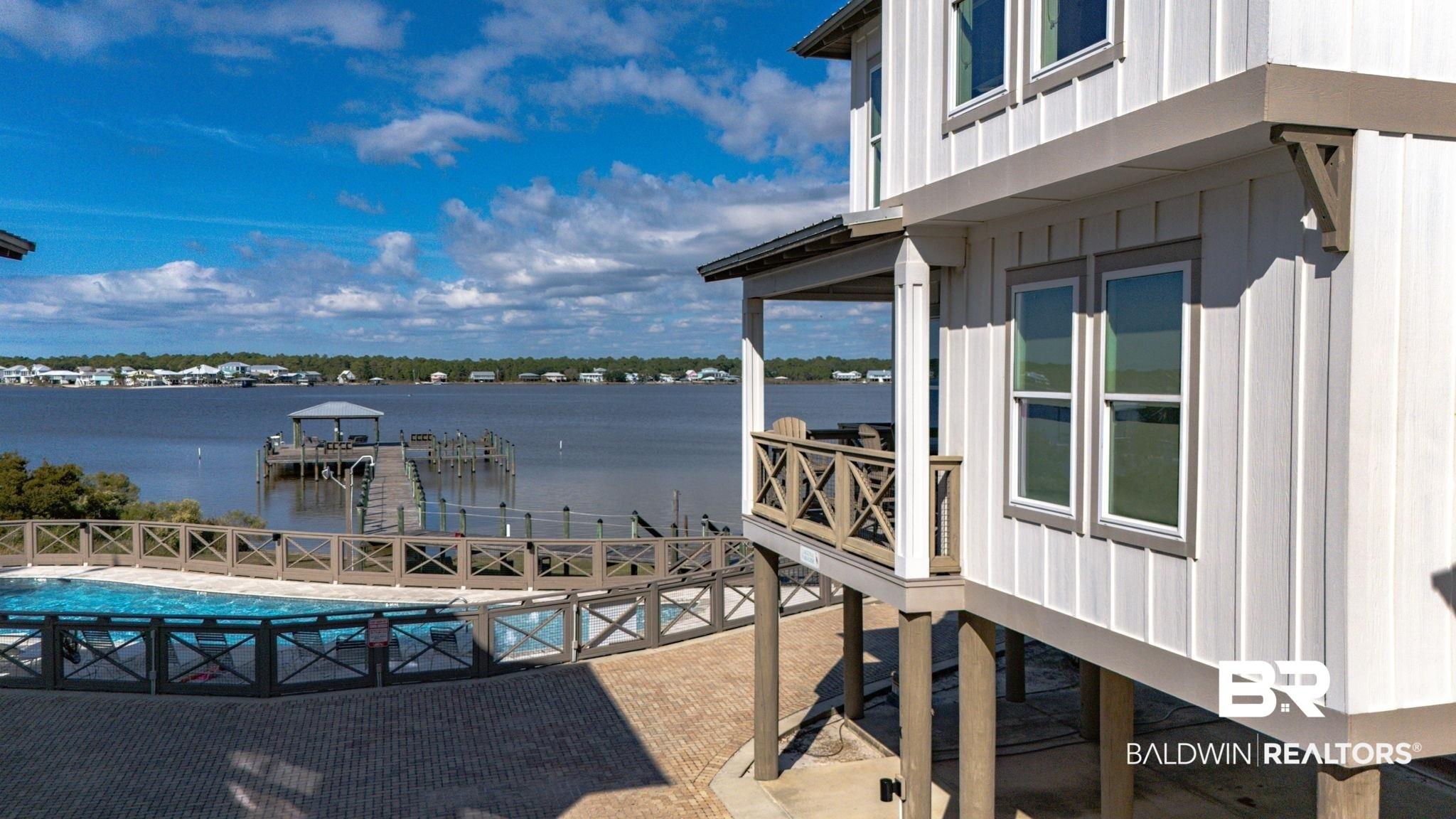 Image 2: House featuring a water view