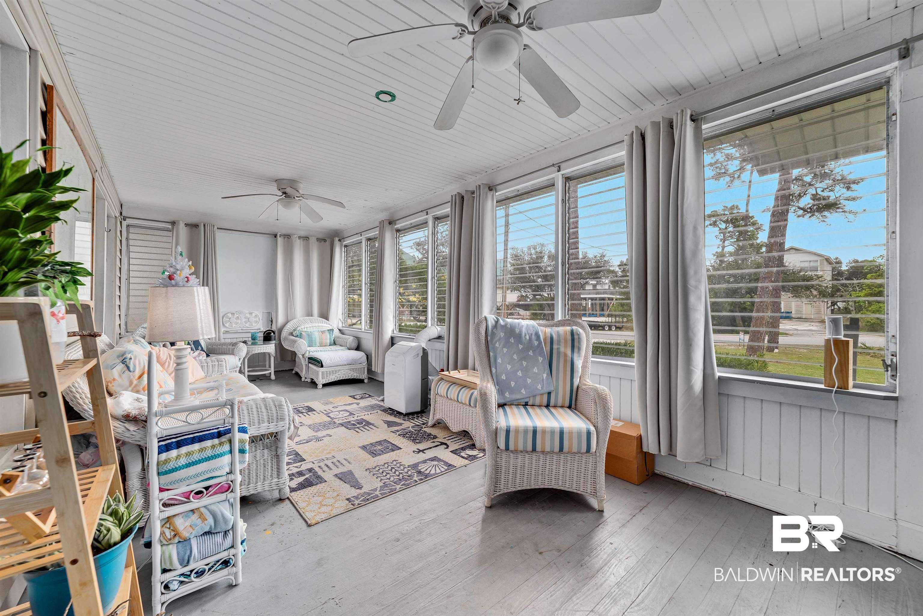 Image 3: Sunroom / solarium featuring a ceiling fan and wood-type flooring