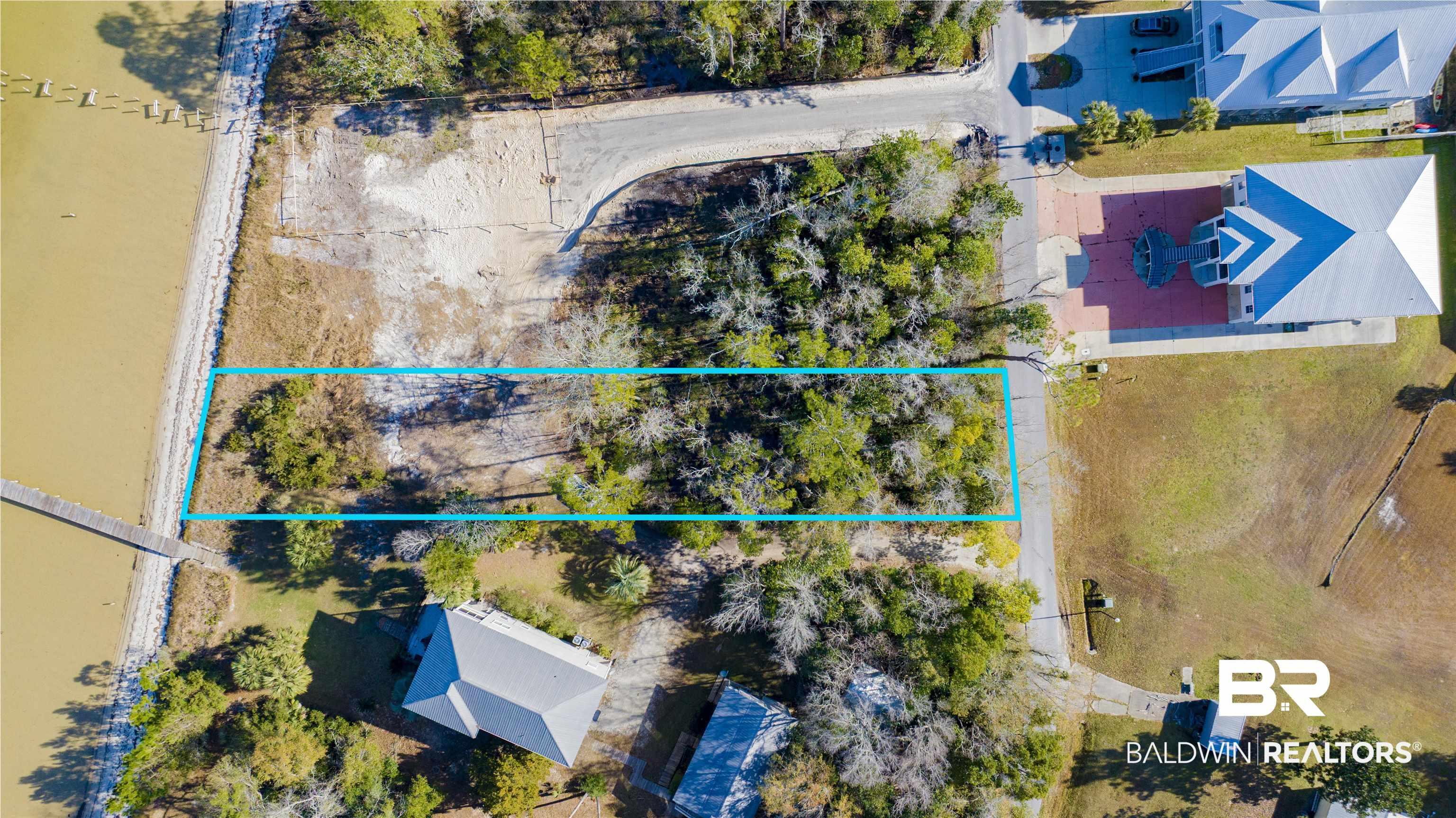 Image 4: Aerial view of property's location featuring property parcel outlined
