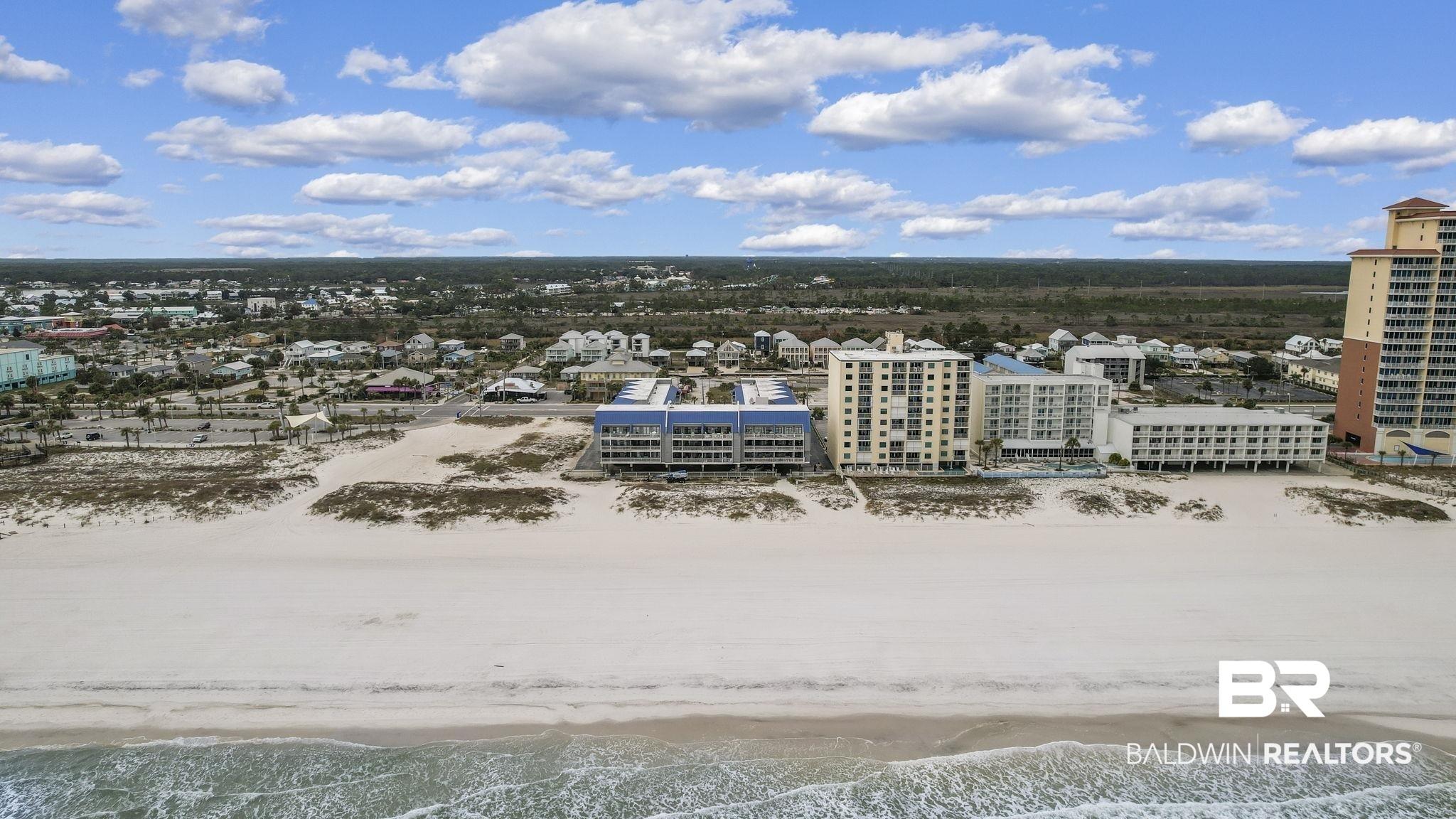 Image 3: View of urban area with local beach