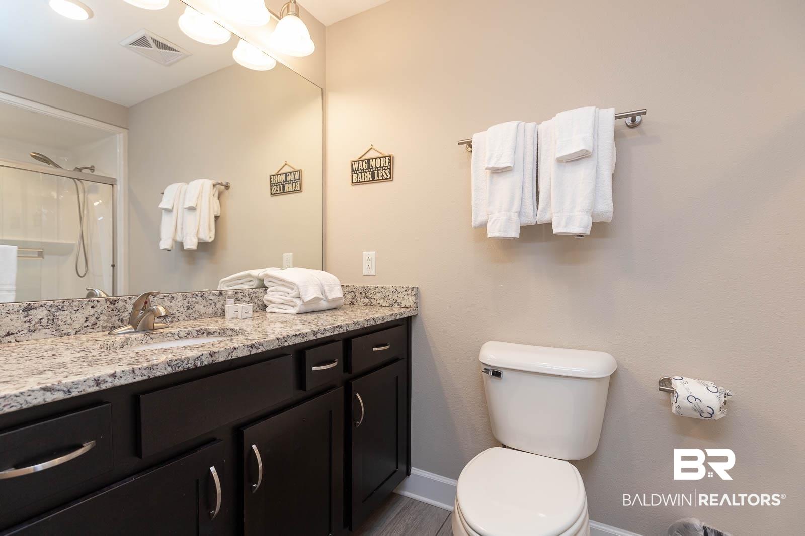 Image 4: Bathroom featuring vanity and an enclosed shower