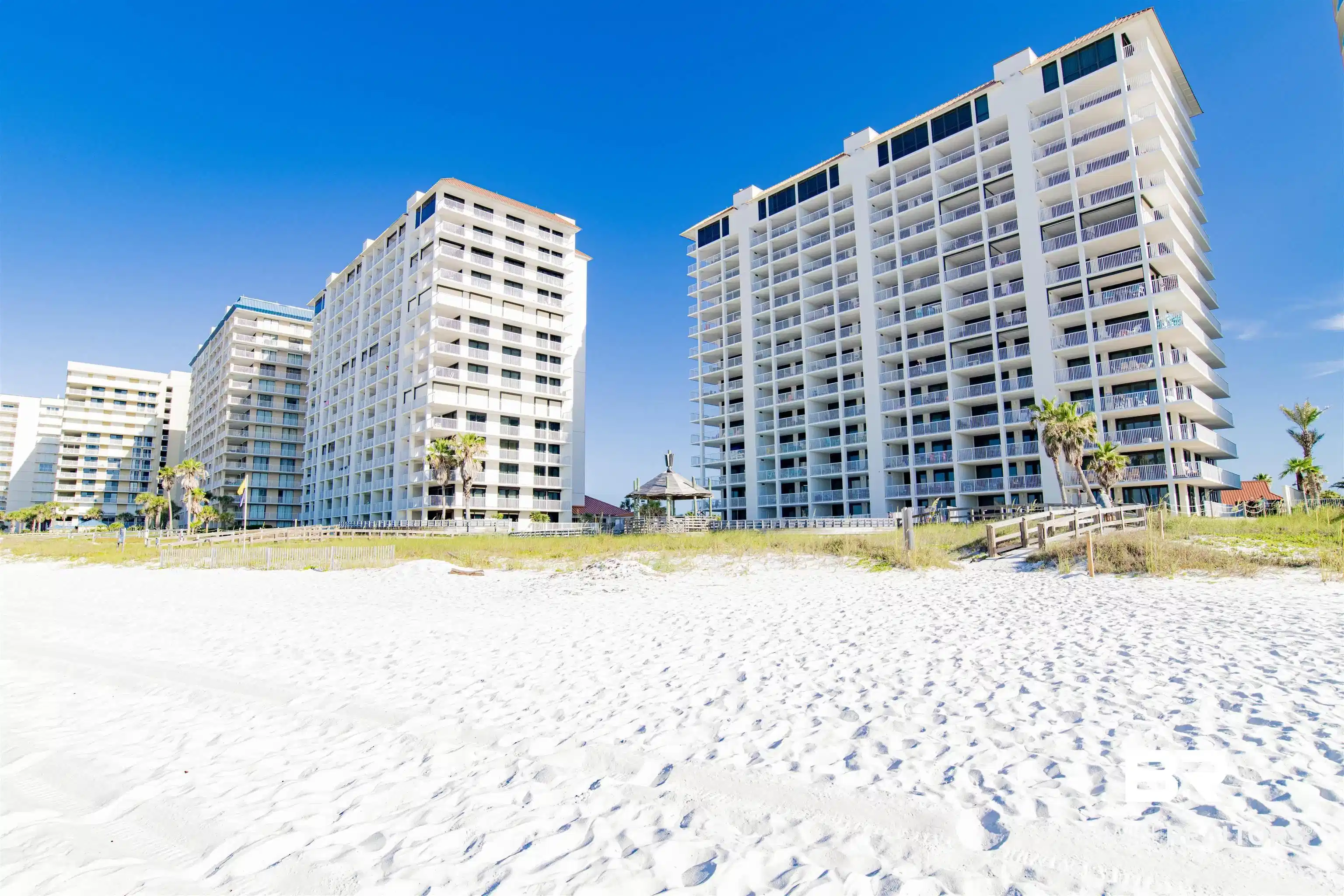 Image 1: View of apartment building / complex