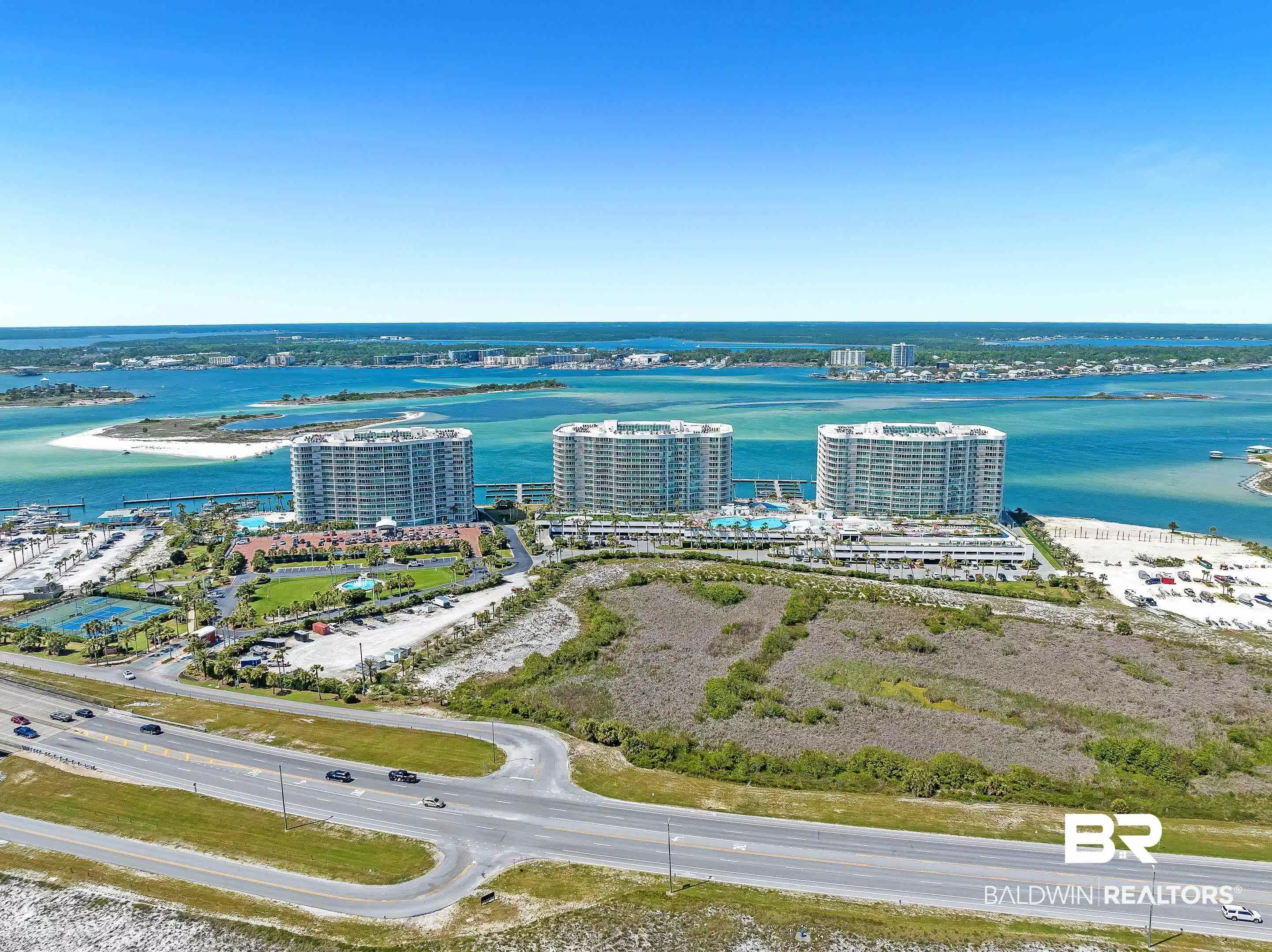 Image 1: View of urban area with a large body of water