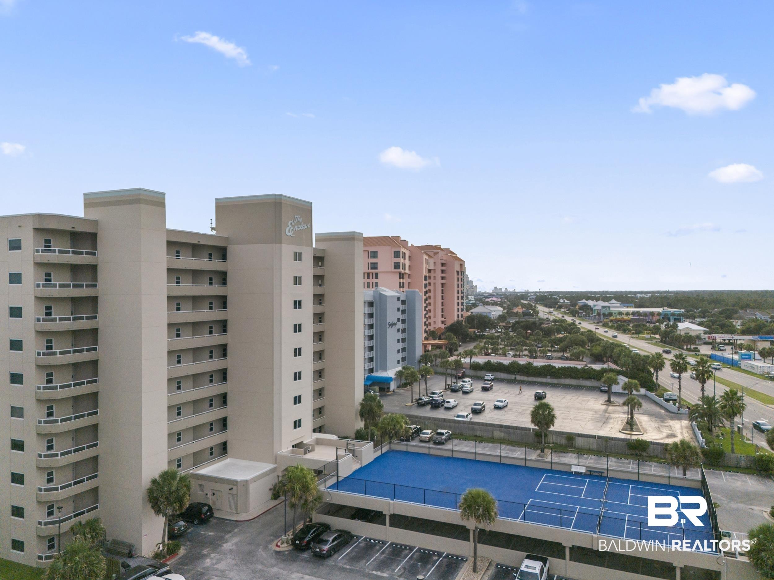 Image 2: View of property featuring a community pool