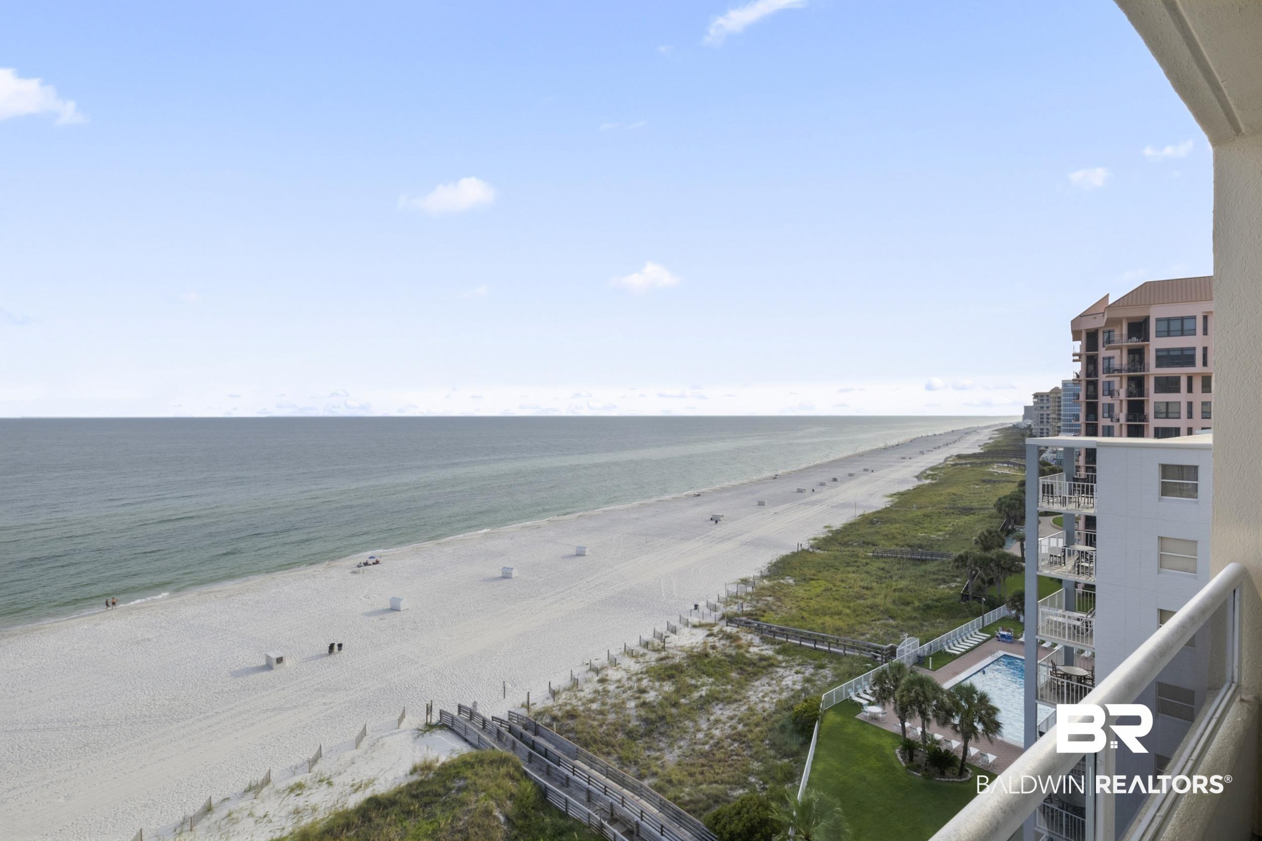 Image 4: Water view with a view of the beach
