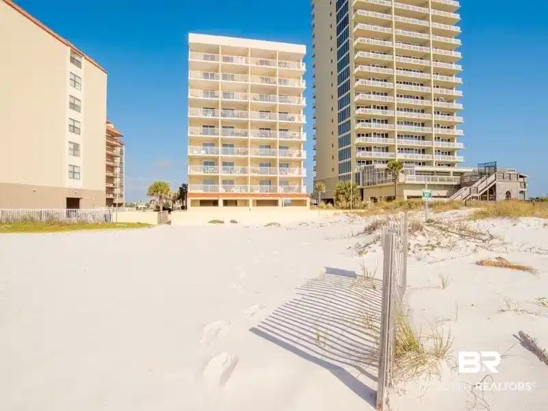Image 1: View of apartment building / complex