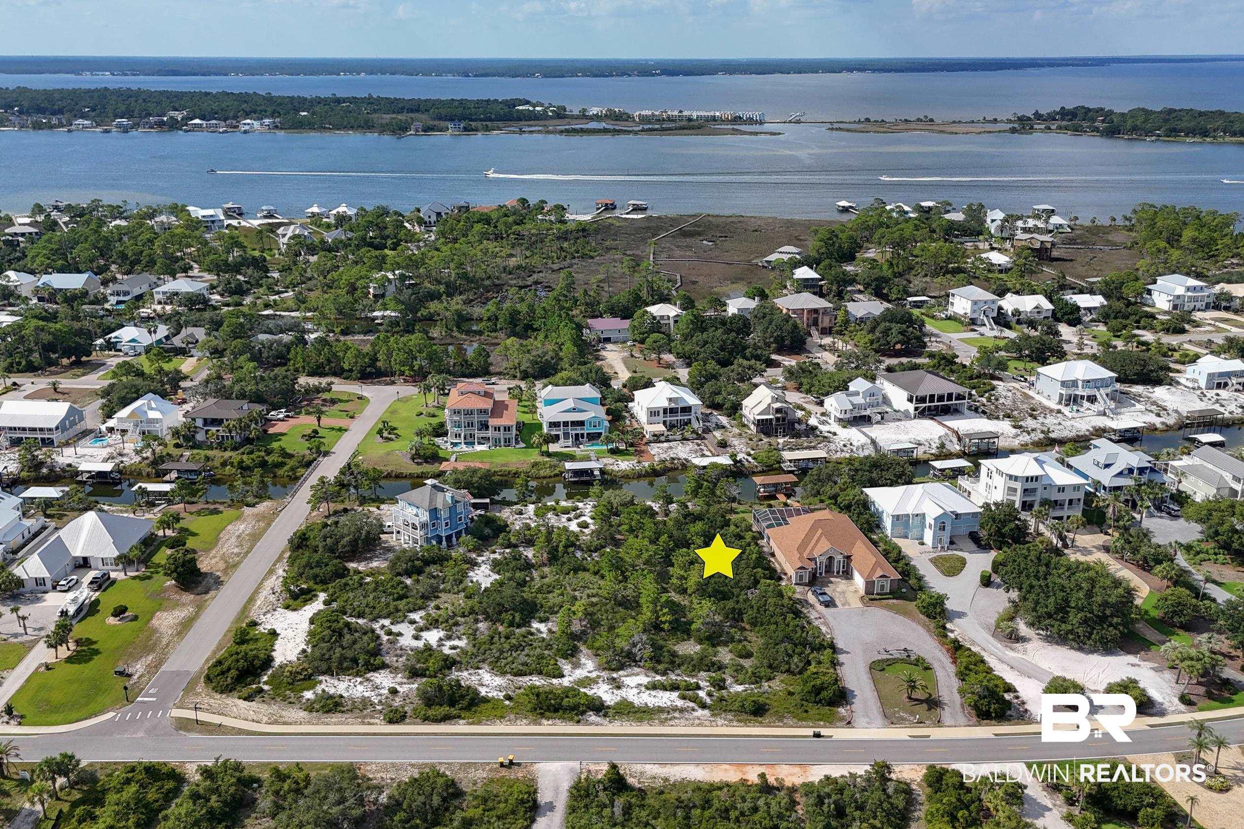 Image 3: Aerial overview of property's location with nearby suburban area