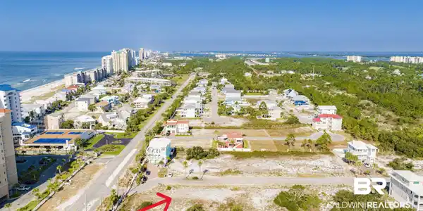 Image 3: View of urban area featuring a large body of water