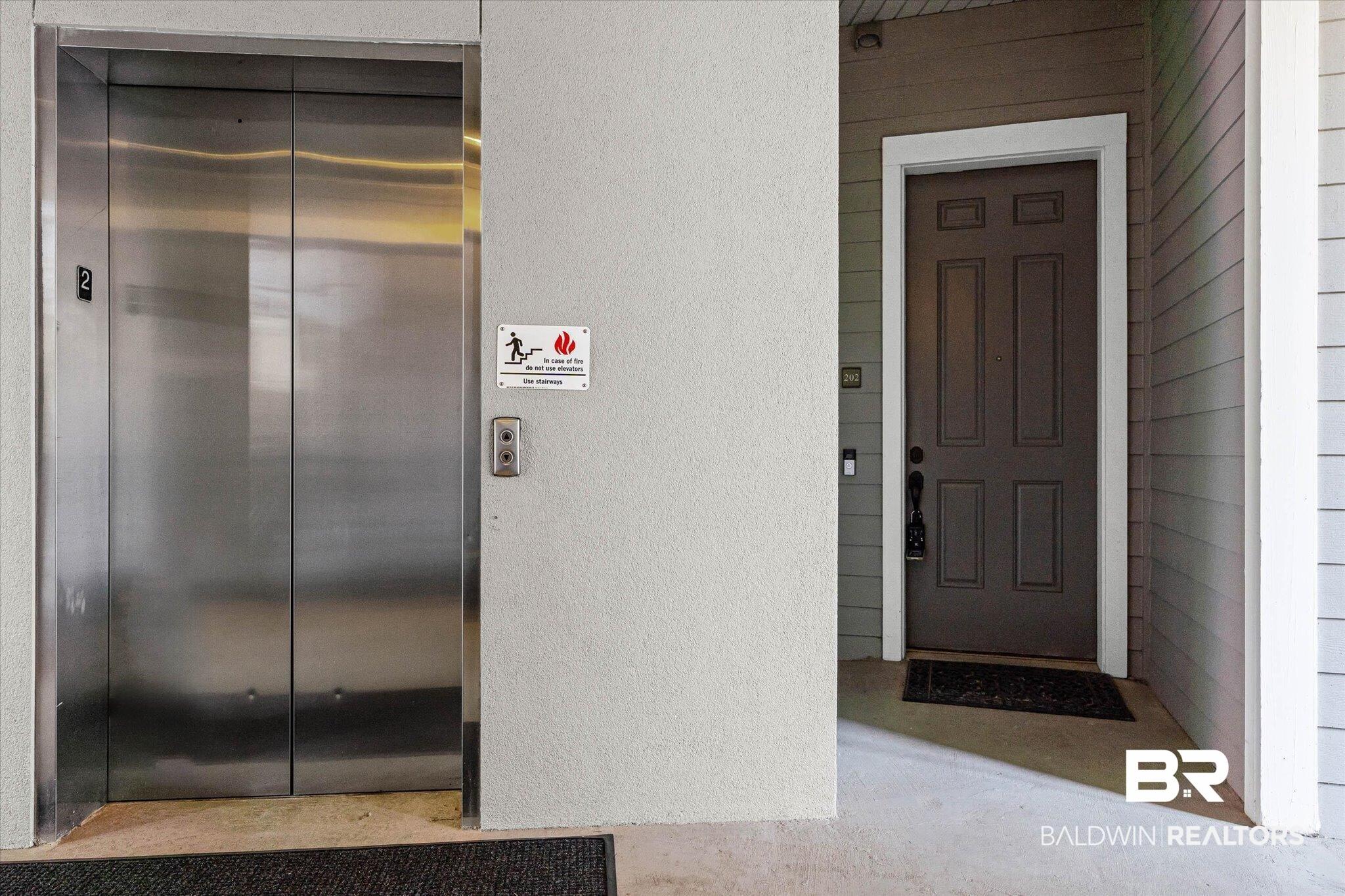Image 3: Property entrance with elevator