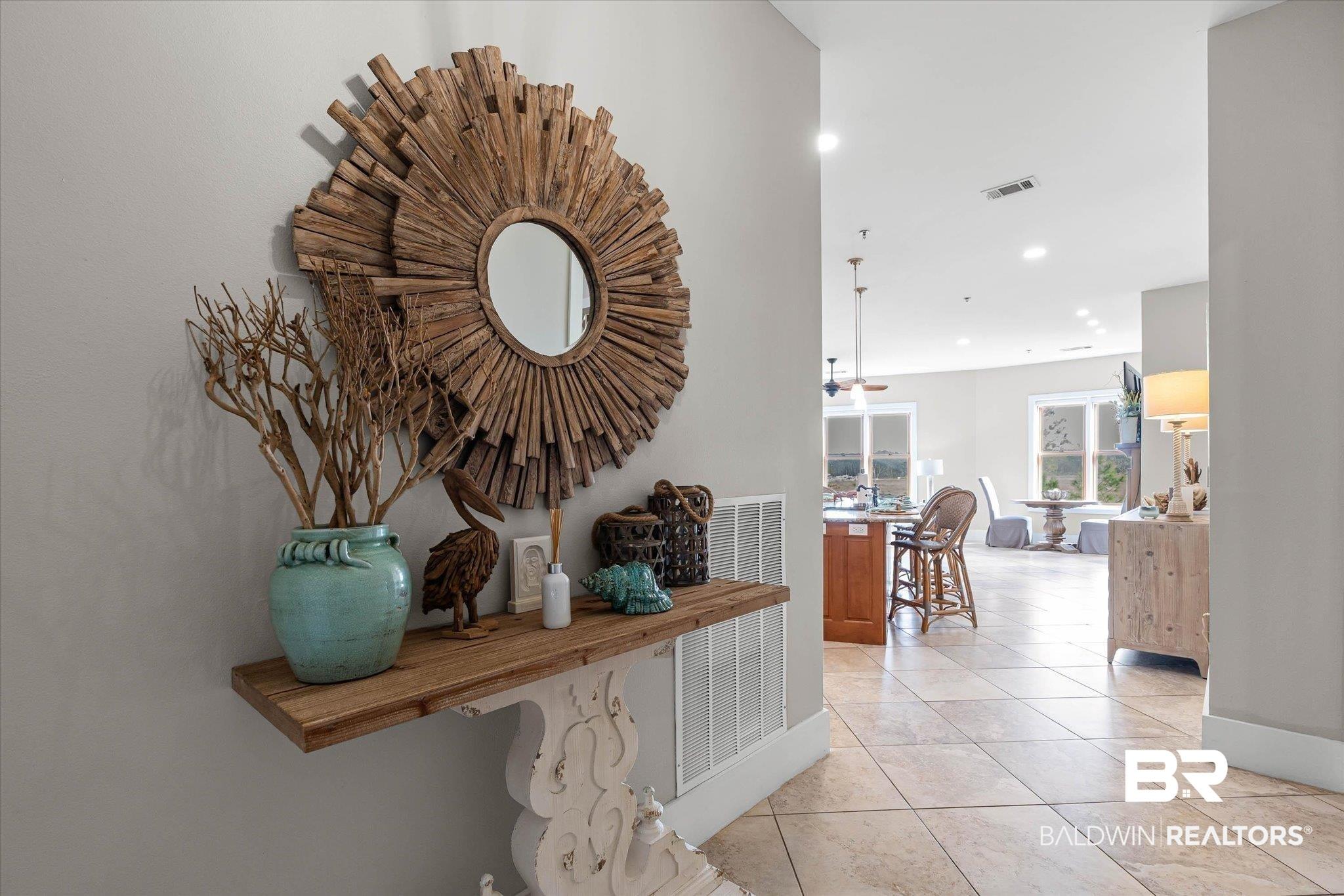 Image 4: Hallway with recessed lighting and light tile patterned floors