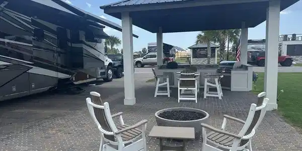 Image 4: View of patio / terrace featuring a fire pit, exterior kitchen, and a gazebo