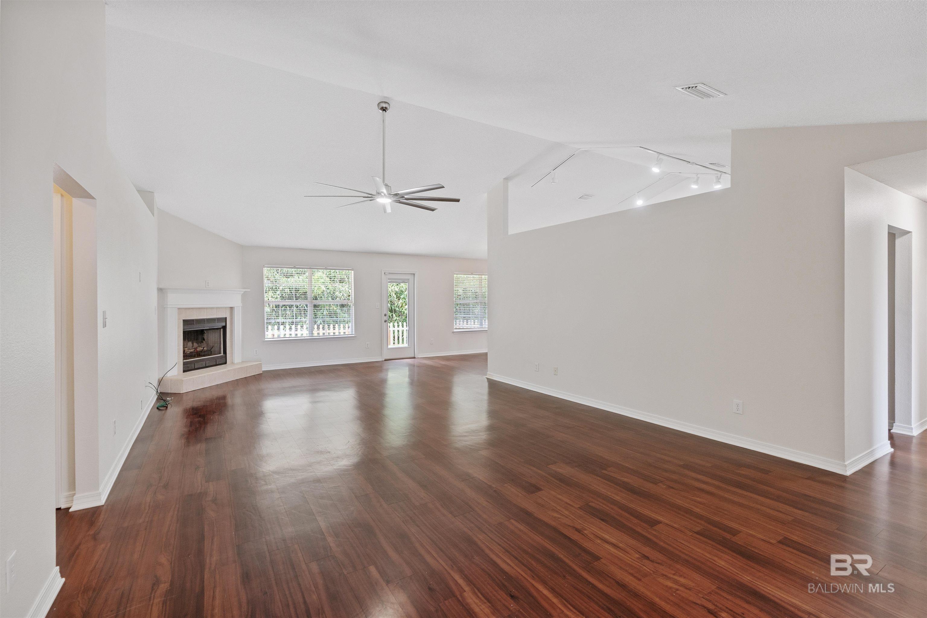 Image 3: Living Room with vaulted ceilings