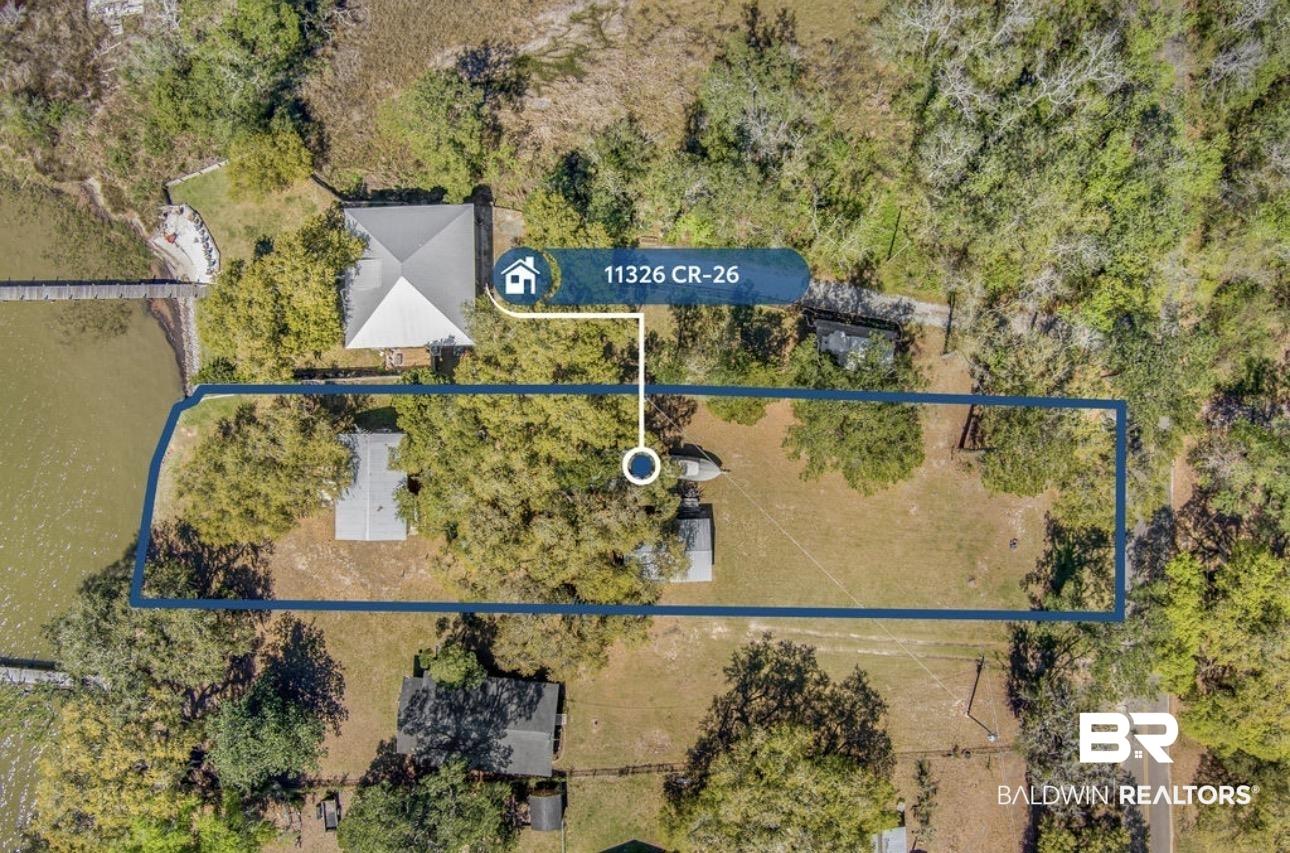 Image 4: Aerial overview of property's location featuring property parcel outlined