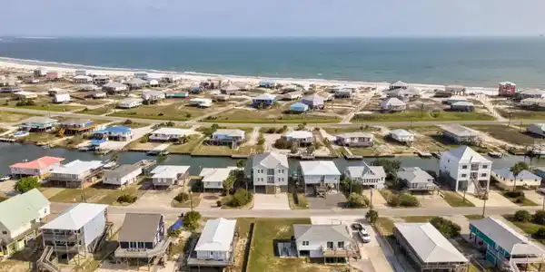 Image 4: Coastal community featuring waterfront properties and direct Gulf access
